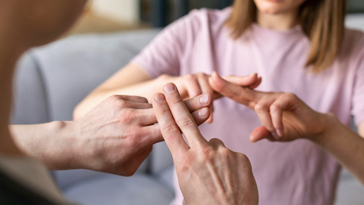 Hände, die gebärden